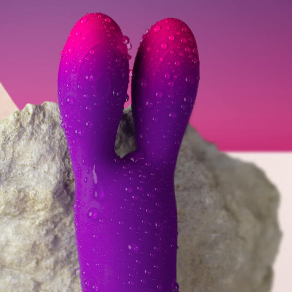 Glo girl bunny vibrador flexible morado