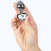 Plug anal de metal Secretplay con corazón transparente talla S 7 cm