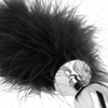 Kink plug anal 11 x 7 cm acero inoxidable con pluma 11 cm